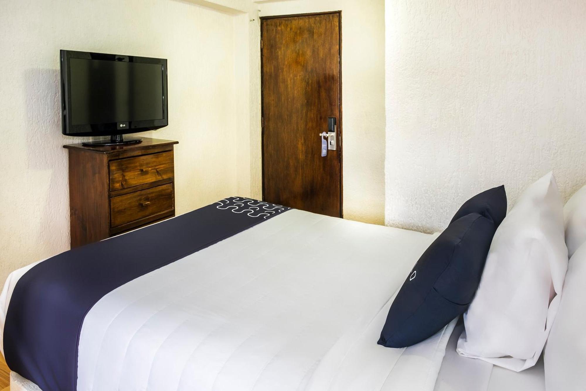 Capital O Hotel Central, Ксалапа Екстериор снимка